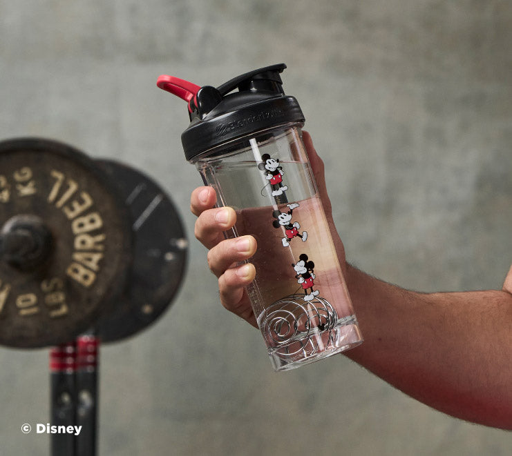 pro-series-m3 Mickey_Mouse_Protein_Shaker_Bottle_Being_Held_In_the_Gym.jpg